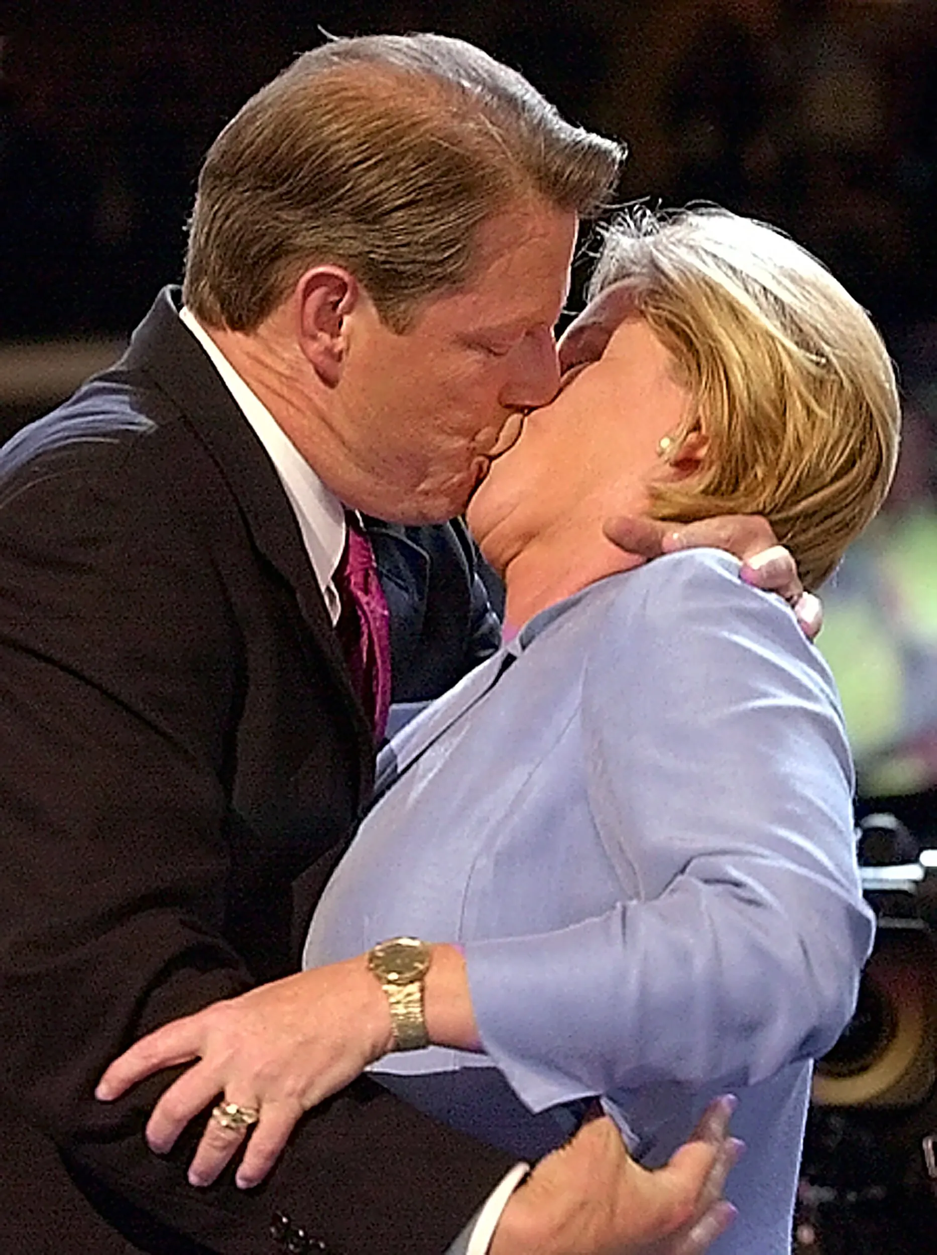 Exuberance — Vice President Al Gore kisses his wife Tipper as he steps onto the stage at the Democratic National Convention in Los Angeles, California Thursday, August 17, 2000. After greeting his wife in front of a packed convention hall, Gore proceeded to the podium to accept his party's nomination.  (AP Photo/Stephan Savoia)  © The Associated Press