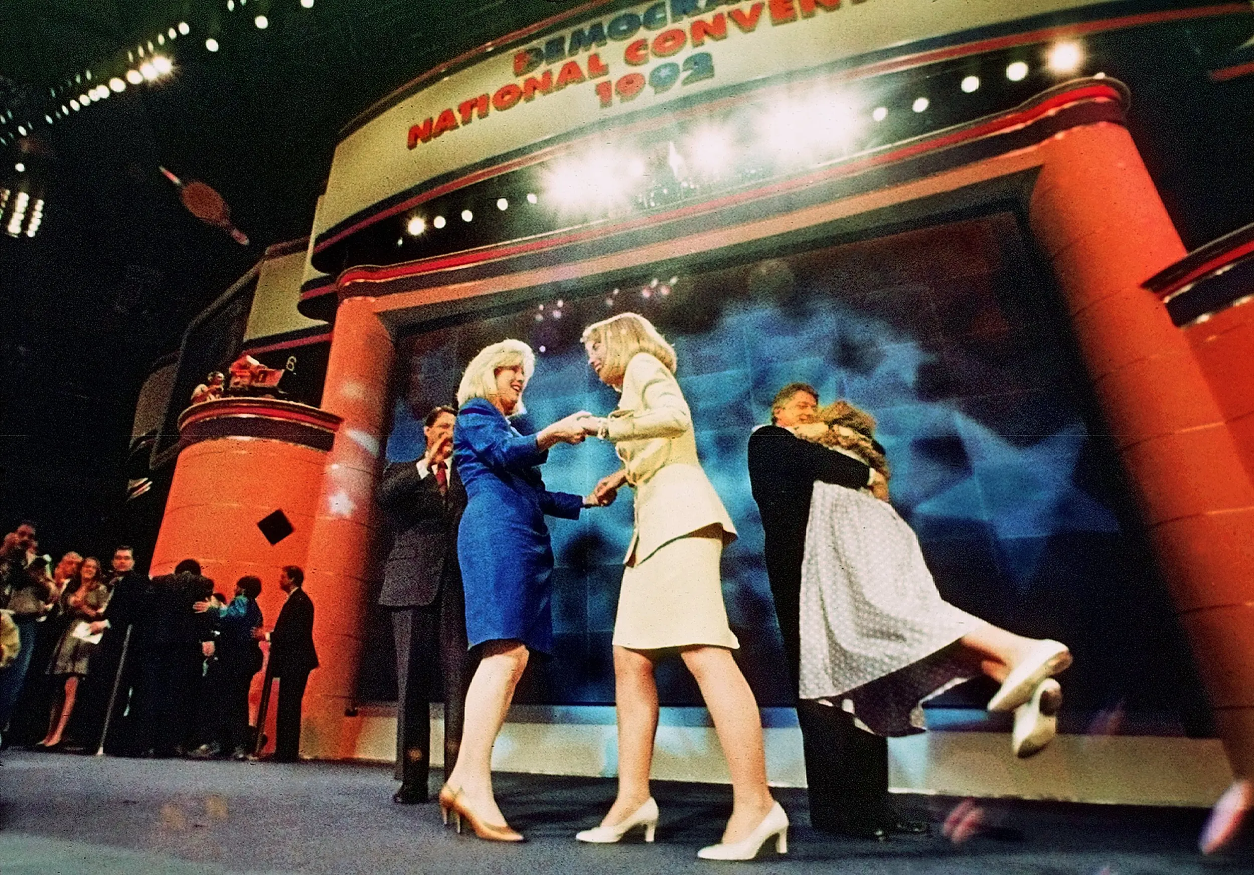 Celebrate Celebrate Dance To The Music — Tipper Gore, left, and Hillary Rodham Clinton join hands in dance as newly coined Democratic presidential nominee Bill Clinton twirls his daughter, Chelsea, while hugging her at the end of the Democratic National Convention in New York City, Thursday night, July 16, 1992. Clinton and Al Gore accepted their party's nomination before a packed house of Democrats.  (AP Photo/Stephan Savoia)  © The Associated Press