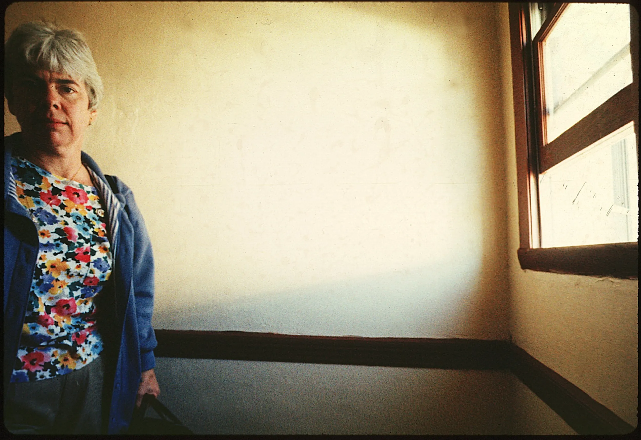 A Visiting Nurse's Rounds — Audrey Peterson, a maternal child healthcare nurse with the Visiting Nurse Association of Boston, walks down a flight of stairs after seeing a patient in one of Boston’s icon “triple-deckers” located in the city’s Dorchester community on September 30, 1993. Peterson has been a nurse with the VNA of Boston for eight years and sees patients throughout inner-city neighborhoods.  (AP Photo/Stephan Savoia)  © The Associated Press