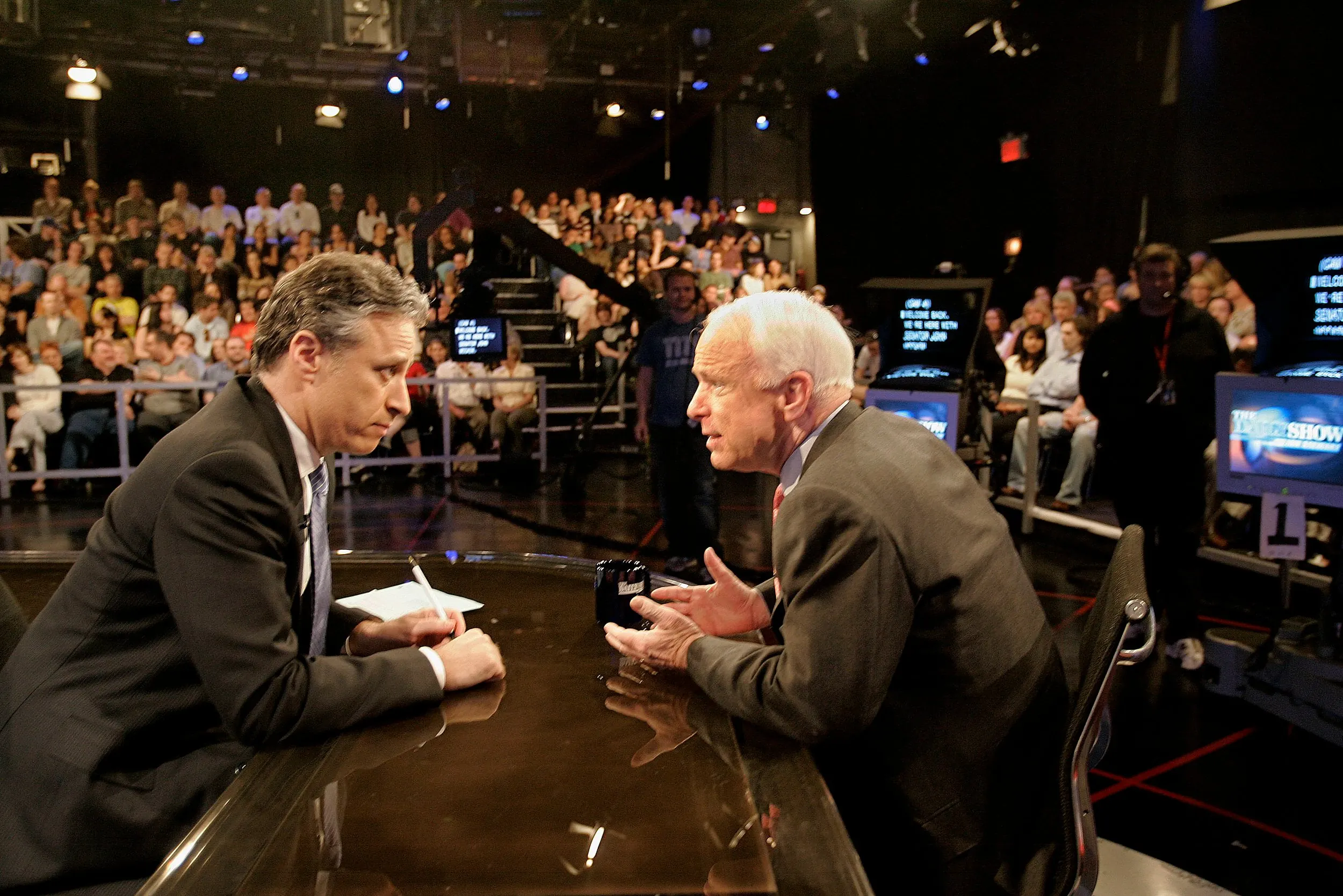 Differing Perspectives — Republican Senator John McCain of Arizona, right, and Jon Stewart talk during a taping of 'The Daily Show with Jon Stewart' in New York City on Tuesday evening, April 24, 2007. McCain officially announced his candidacy for President of the United States the next day in New Hampshire.  (AP Photo/Stephan Savoia)  © The Associated Press